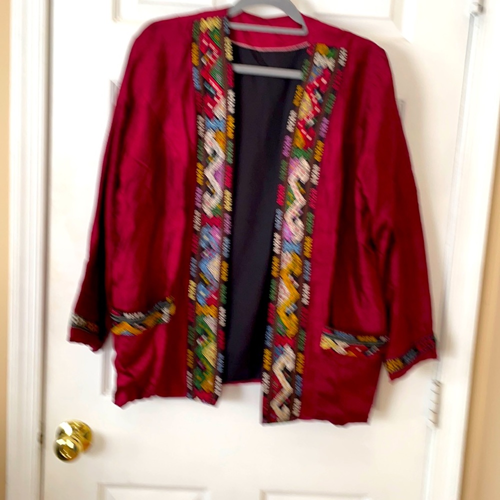 Burgundy silk jacket.
